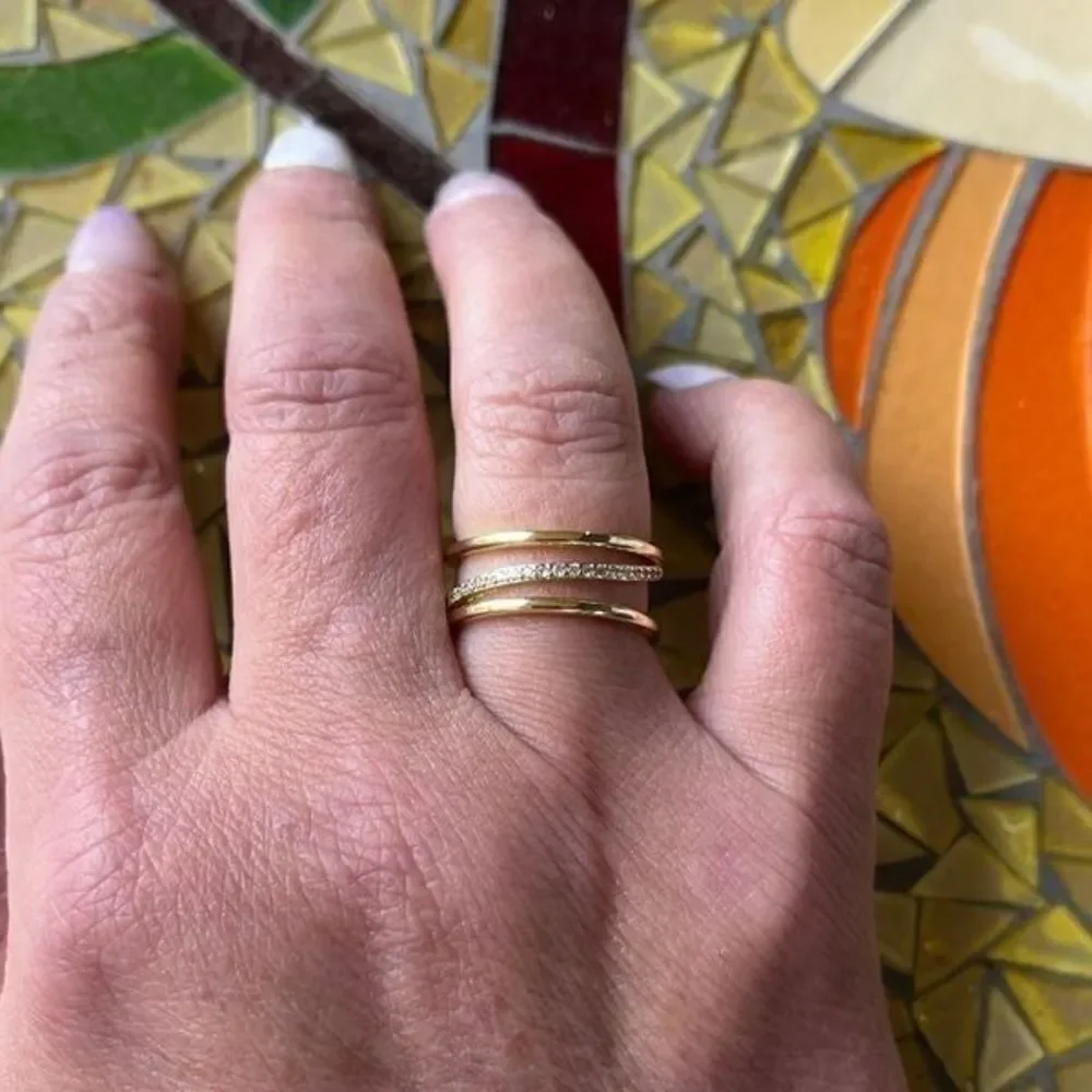 The Triple Bling Ring adjustable in 14k gold over 925 with cubic zirconia